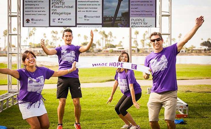 21-year pancreatic cancer survivor with her family at the walk to end pancreatic cancer.